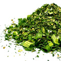 pile of green goddess dressing mix spices including green onions and herbs