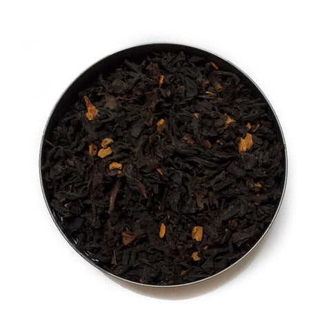 Small round dish with loose leaf Amaretto Spice tea