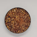 small round dish of castro mix loose spice