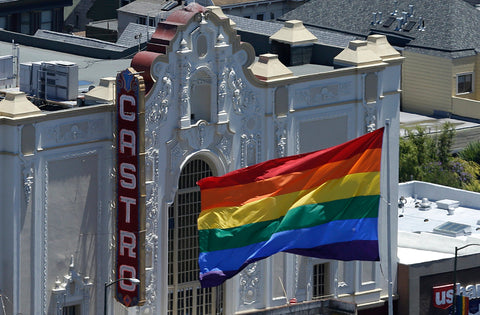 pride flag in front of the Castro building in San Francisco California