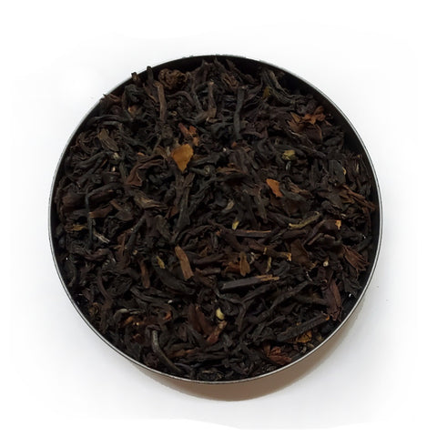 small round dish of Organic Darjeeling TGFOP loose leaf tea