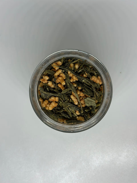 small jar with organic genmaicha loose leaf tea