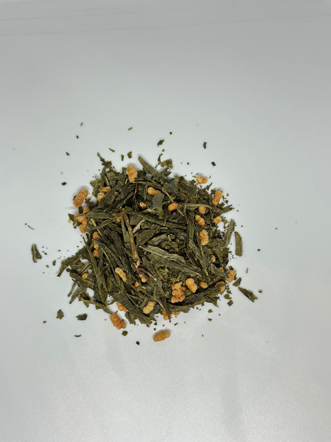 overhead view of loose pile of organic genmaicha loose leaf tea