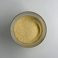 Small dish with loose pile of Granulated Garlic