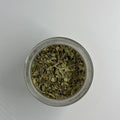 Small dish with loose pile of Lemon Verbena