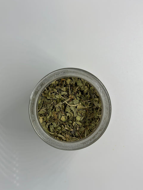 Small dish with loose pile of Lemon Verbena