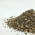 side view of a loose pile of lemon pepper