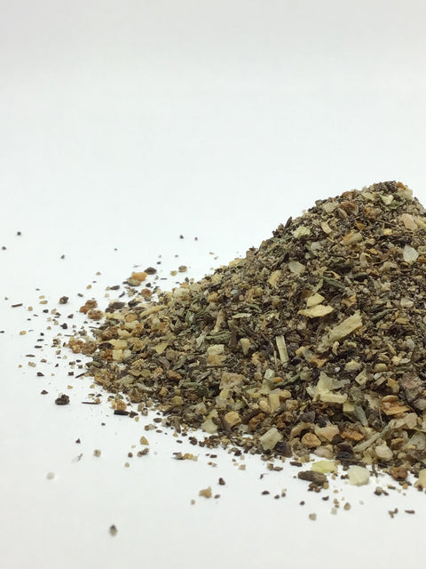 side view of a loose pile of lemon pepper