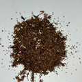 over head view of a loose pile of Rainbow Rooibos loose leaf tea